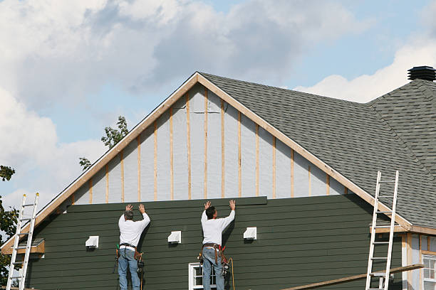 Professional Siding Contractor technician working in Winfield, IN